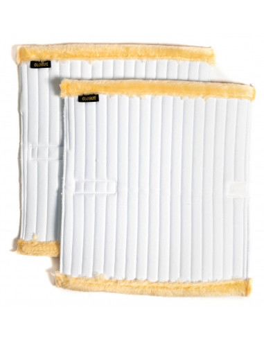 Benpaddar med luddkant